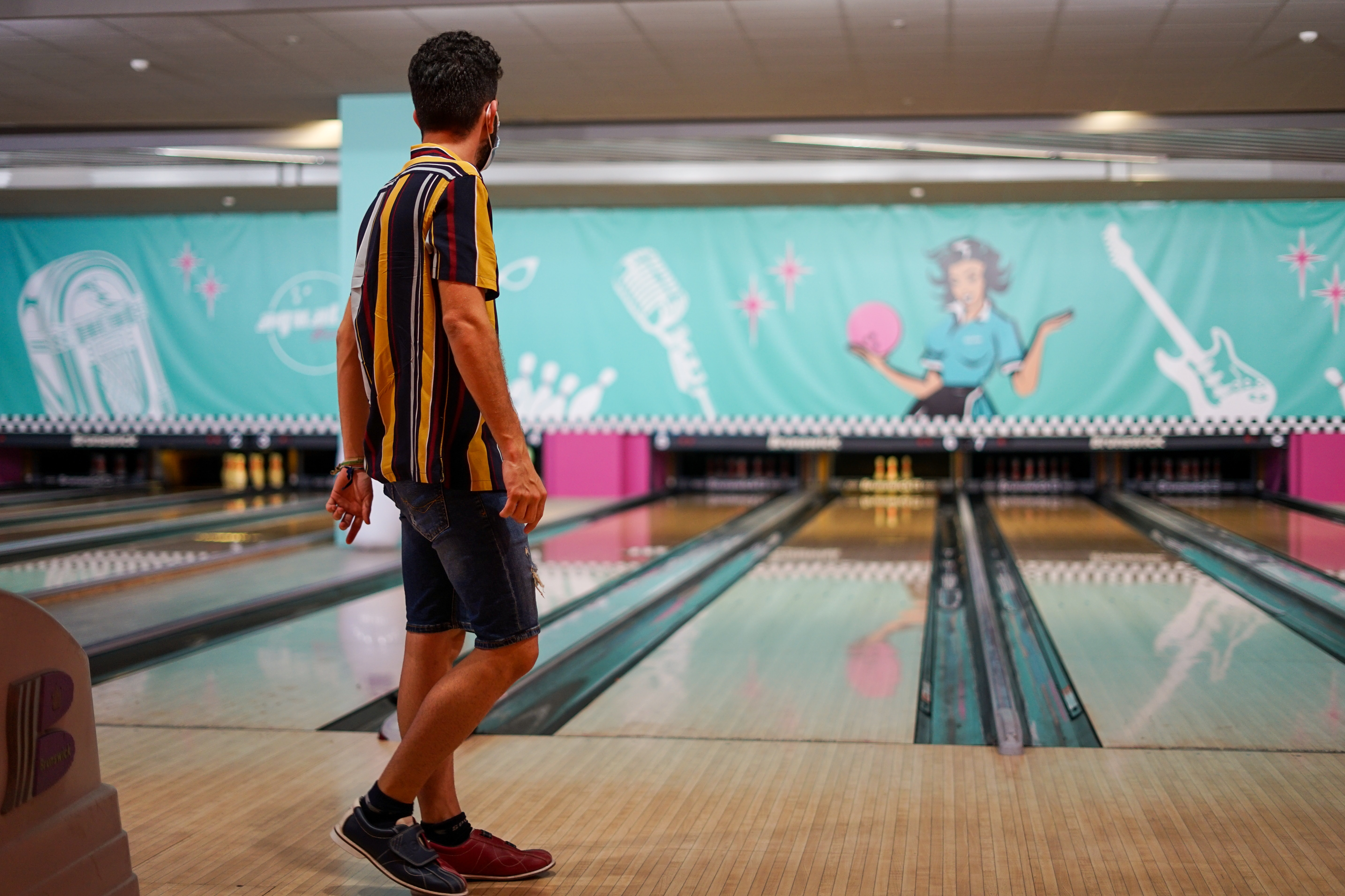 man in a bowling center